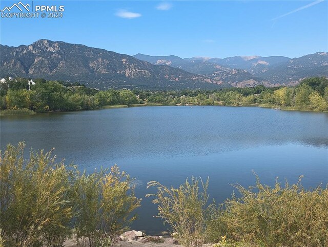 property view of water featuring a mountain view