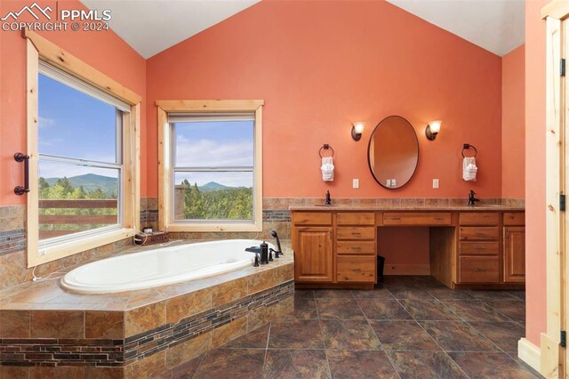 bedroom with multiple windows, ceiling fan, and carpet flooring