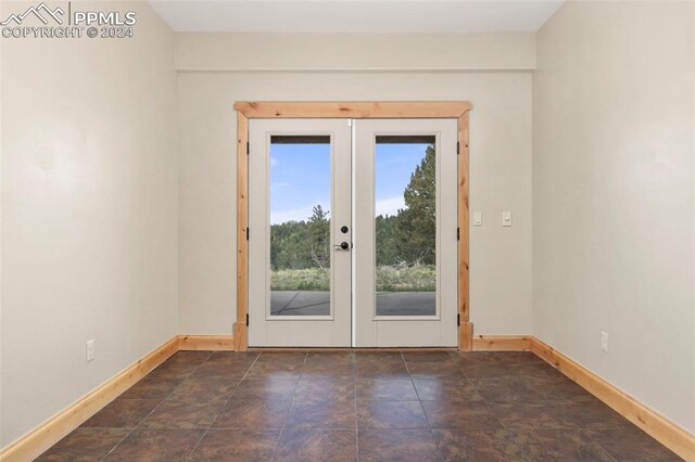 carpeted bedroom with ceiling fan and beamed ceiling