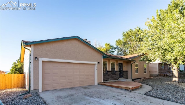 ranch-style house with a garage