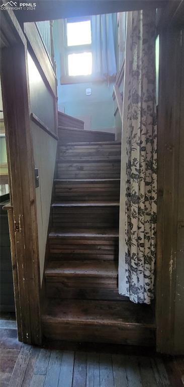 231 Plainview Pl, Manitou Springs, CO 80829 - stairway featuring hardwood / wood-style flooring