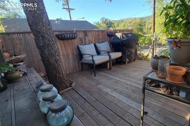 231 Plainview Pl, Manitou Springs, CO 80829 - wooden terrace with area for grilling and fence