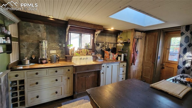 231 Plainview Pl, Manitou Springs, CO 80829 - kitchen featuring a skylight, butcher block countertops, and plenty of natural light