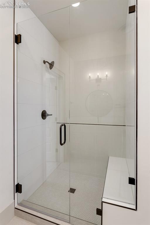 bathroom featuring an enclosed shower