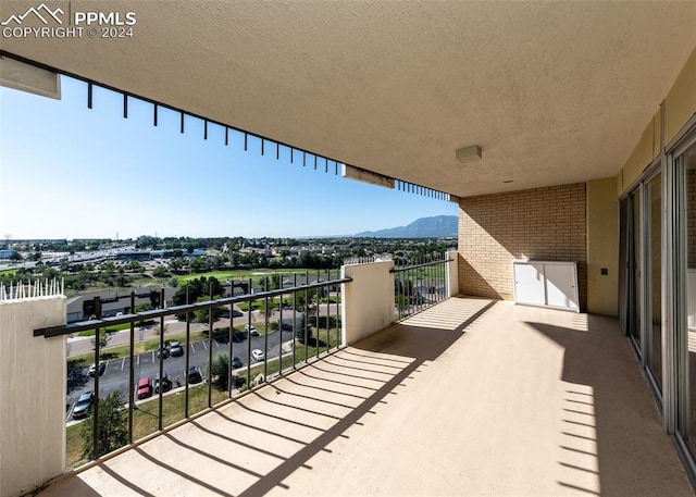 balcony featuring a mountain view