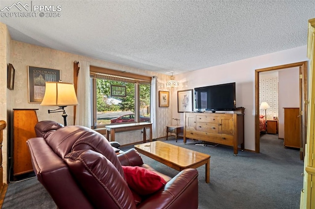 living room with a textured ceiling and dark carpet