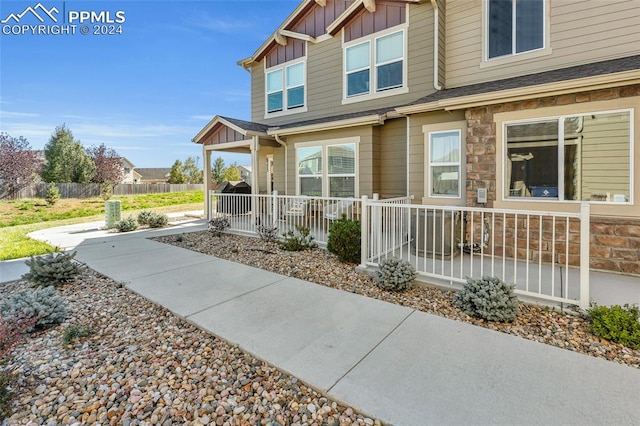 view of property exterior featuring a porch