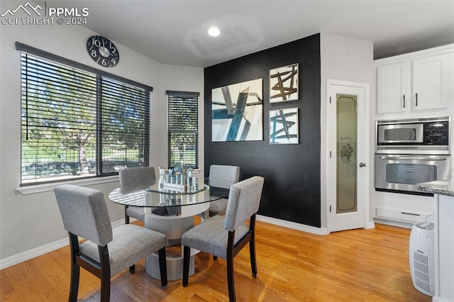 dining room featuring light wood-type flooring