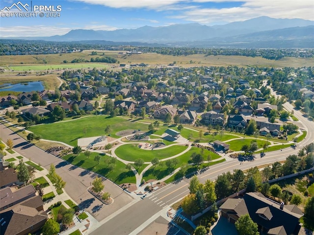 drone / aerial view featuring a mountain view