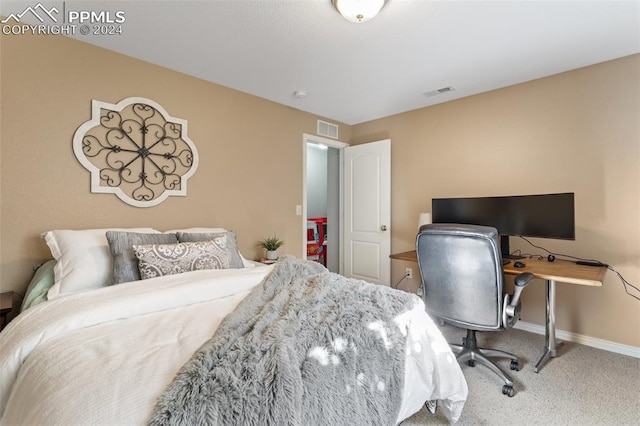 bedroom featuring carpet