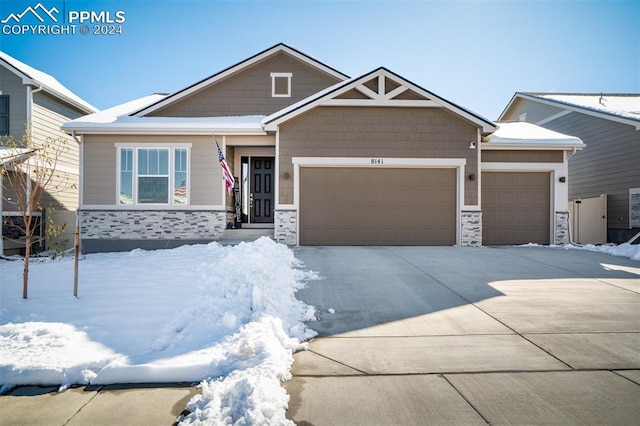 craftsman house featuring a garage