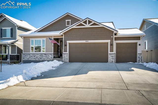 craftsman house featuring a garage