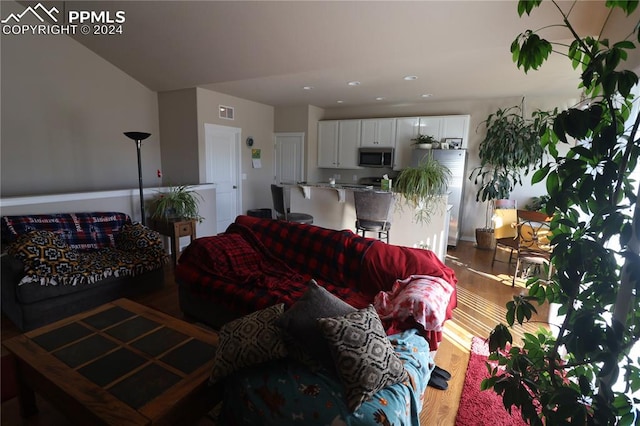 living room with wood-type flooring