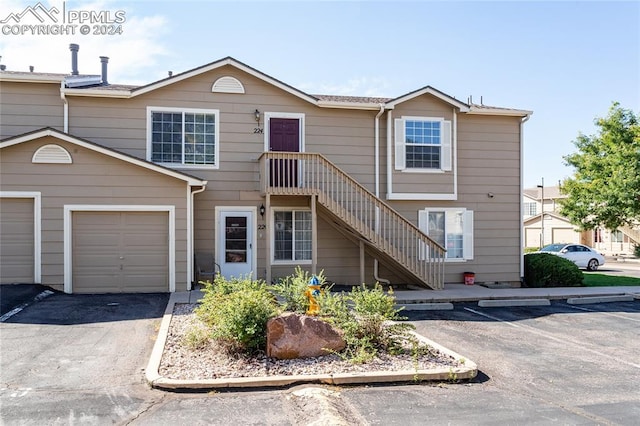 front of property with a garage