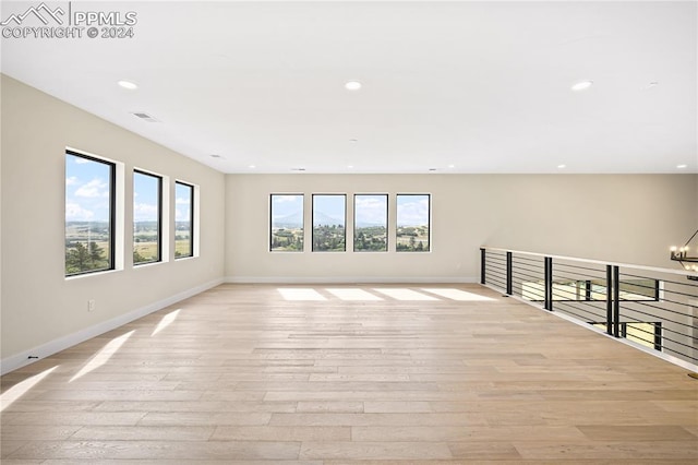 empty room with light wood-type flooring