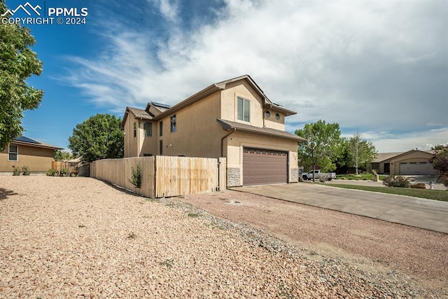 view of front of home with a garage