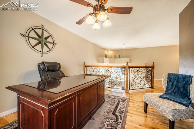 office featuring ceiling fan and light hardwood / wood-style flooring