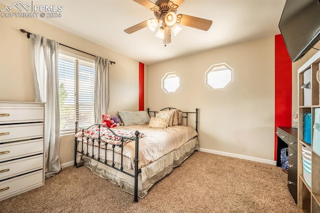 bedroom featuring ceiling fan and light colored carpet