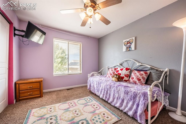 carpeted bedroom featuring ceiling fan