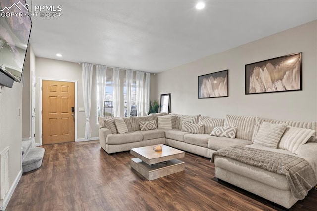 living room with dark wood-type flooring