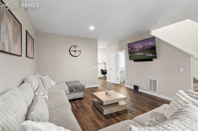 living room featuring dark hardwood / wood-style floors