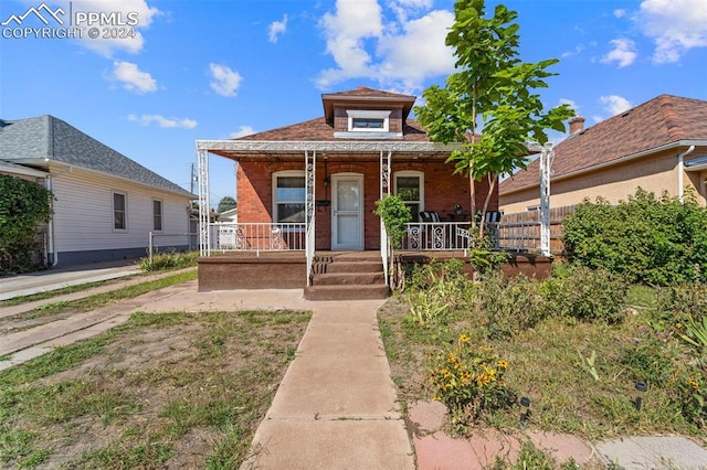 bungalow-style home featuring a porch