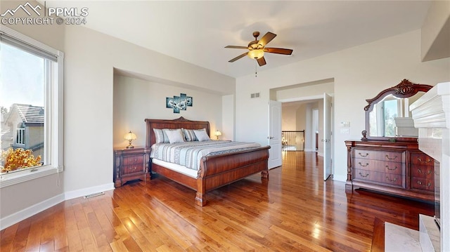 bedroom featuring ceiling fan and wood-type flooring