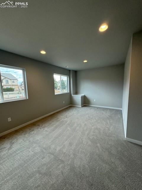 view of carpeted spare room