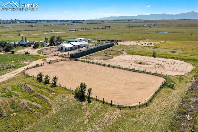 aerial view featuring a mountain view and a rural view