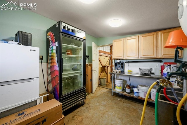 kitchen featuring light brown cabinets