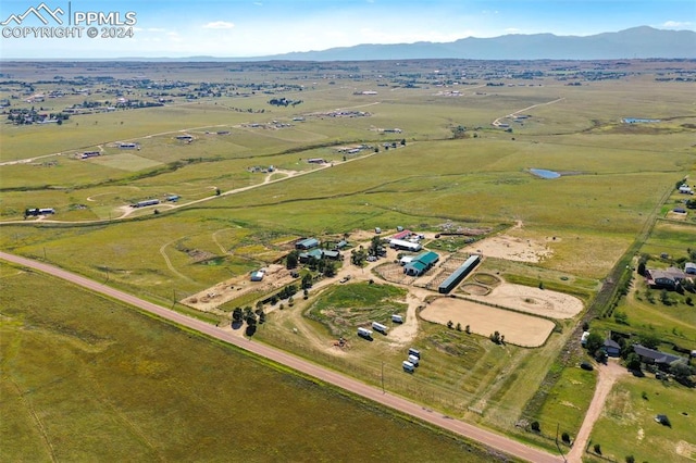 aerial view featuring a mountain view and a rural view