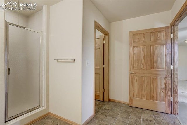 bathroom with an enclosed shower