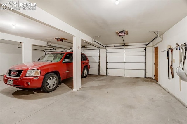 garage featuring a garage door opener