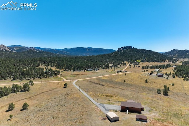 view of mountain feature featuring a rural view