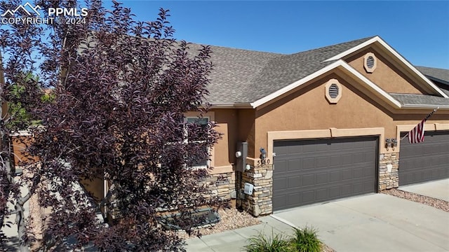 view of front of house with a garage