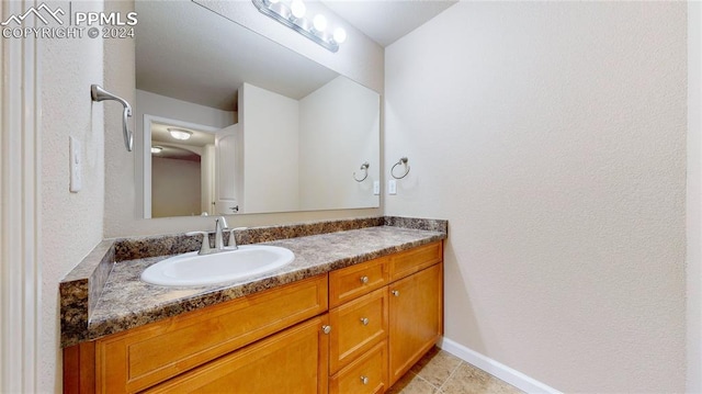 bathroom featuring vanity and tile patterned floors