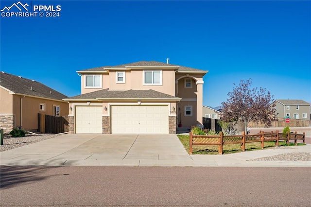 front of property featuring a garage