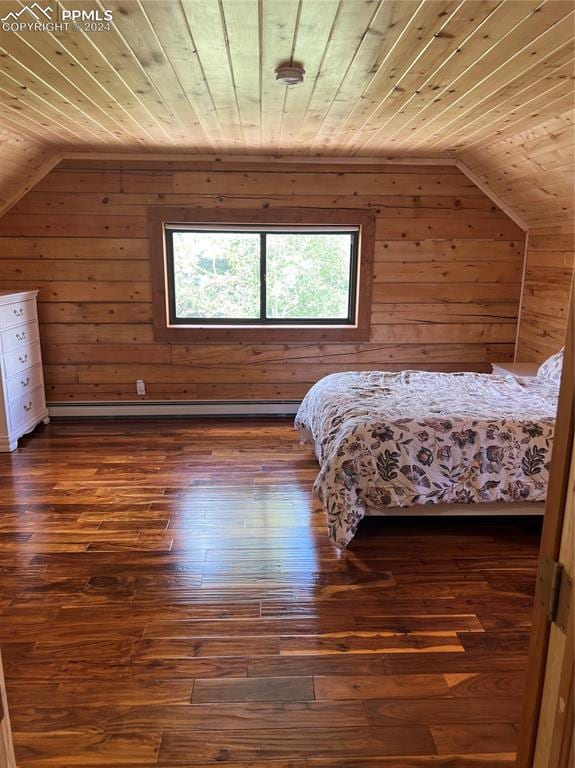 unfurnished bedroom with multiple windows, lofted ceiling, and dark hardwood / wood-style flooring