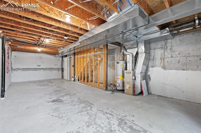 basement featuring gas water heater