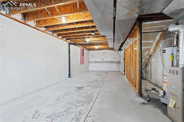 basement featuring water heater