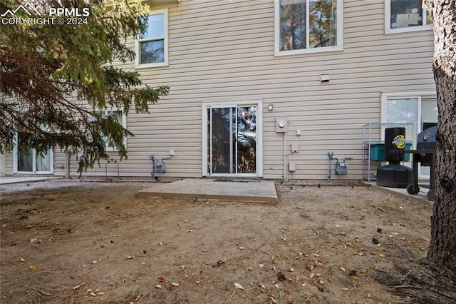 back of house featuring a patio