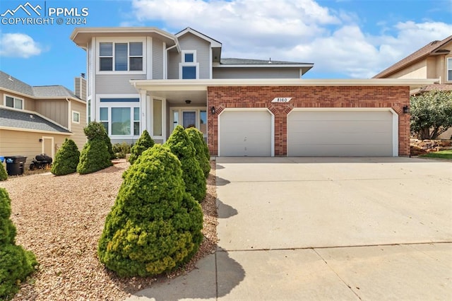 view of front of property featuring a garage