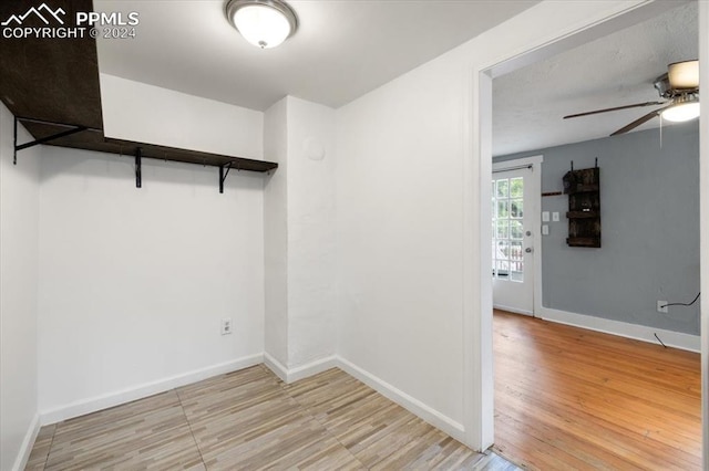 empty room featuring light hardwood / wood-style flooring and ceiling fan