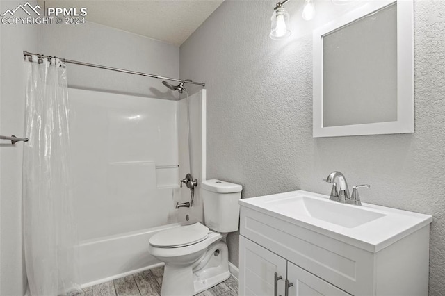 full bathroom with shower / bath combo, vanity, toilet, and wood-type flooring