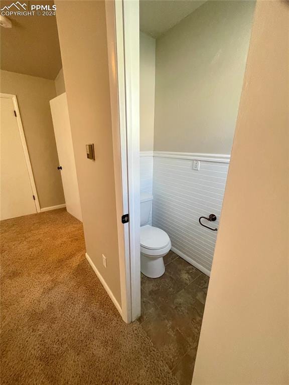 bathroom featuring toilet