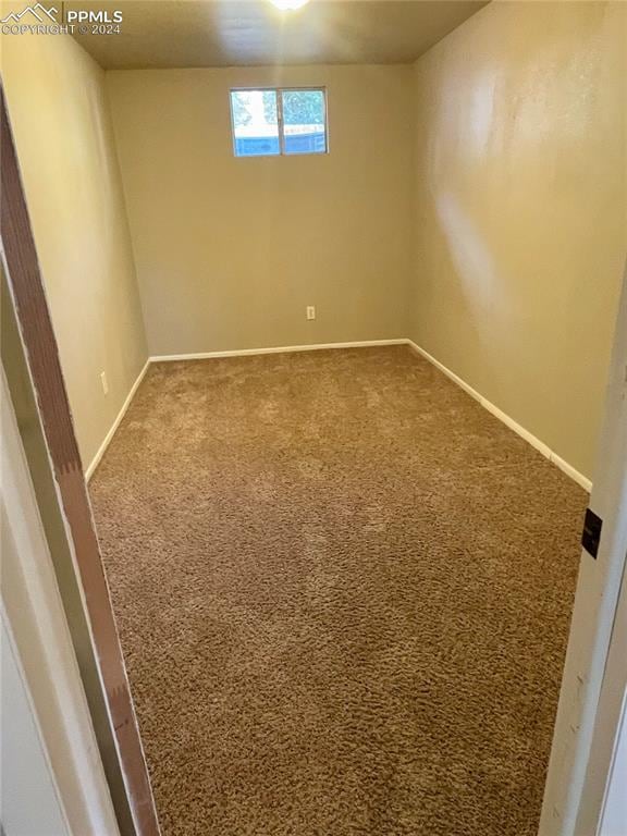 view of carpeted spare room