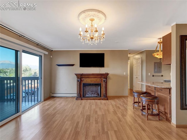 living room with electric panel, baseboard heating, crown molding, and light hardwood / wood-style floors