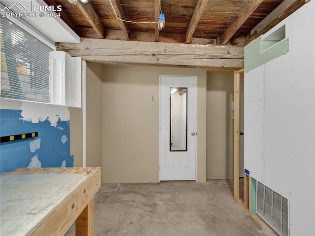 basement featuring wood ceiling