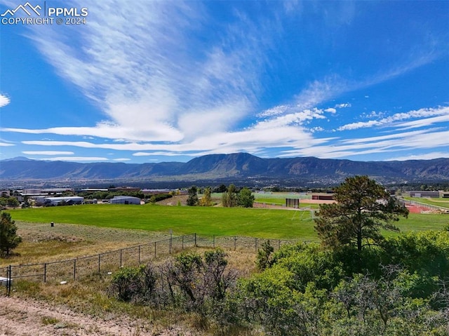 mountain view featuring a rural view