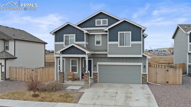 craftsman inspired home with a garage